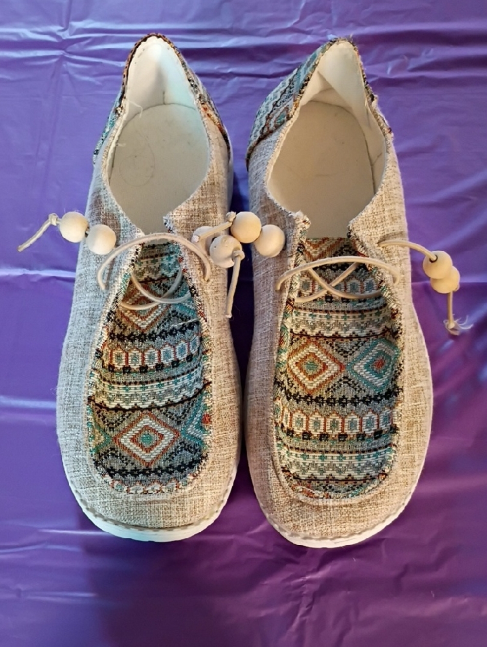 Women’s Neutral Woven Slip-On Shoes with Teal Pattern